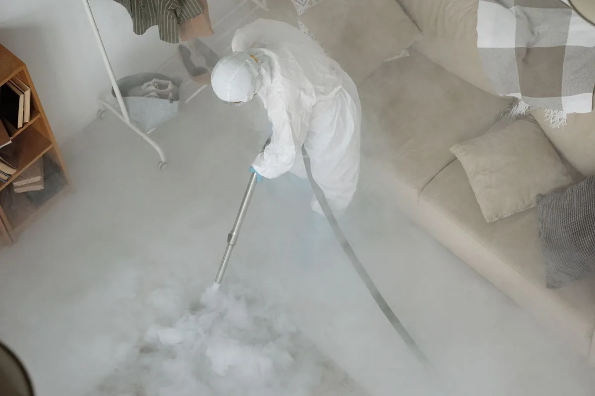 Biohazard cleanup technician in protective equipment, Flagami, Miami, FL